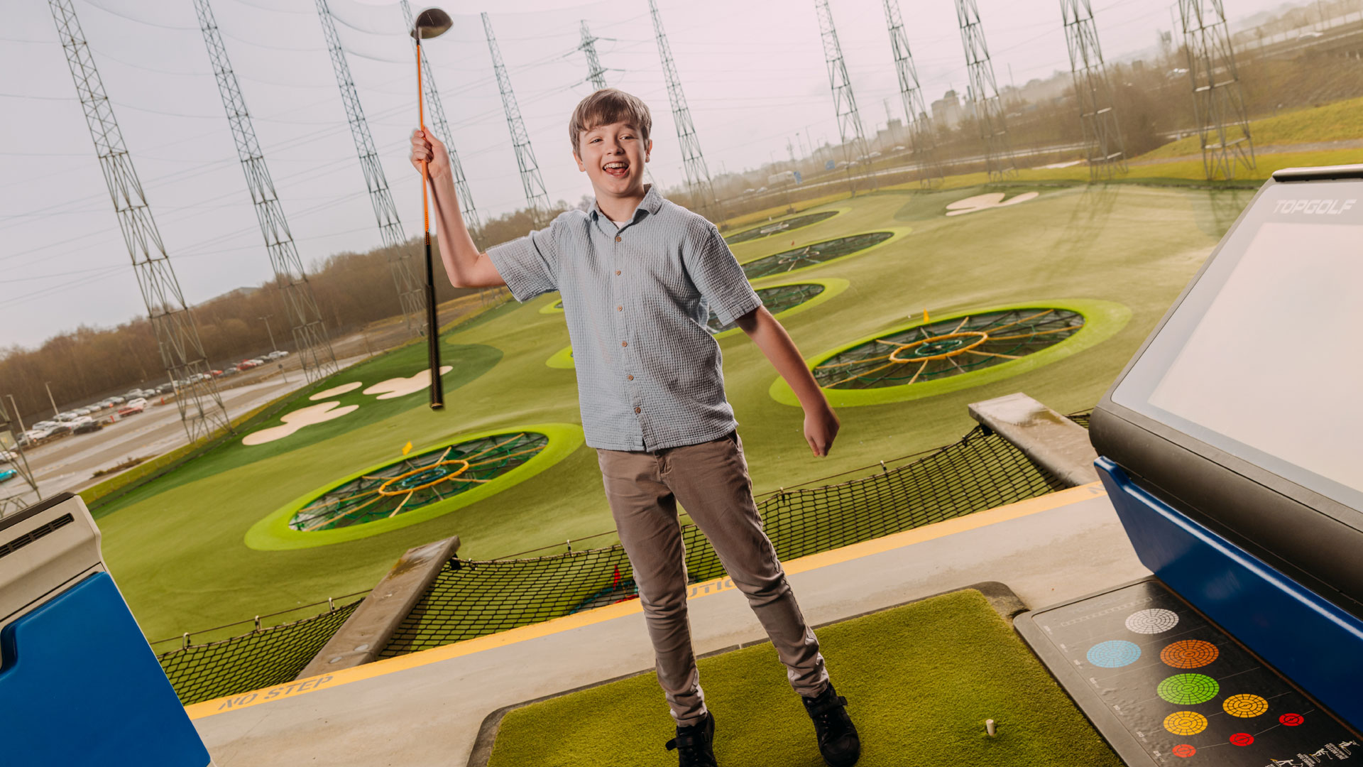 Family in a Topgolf Bay